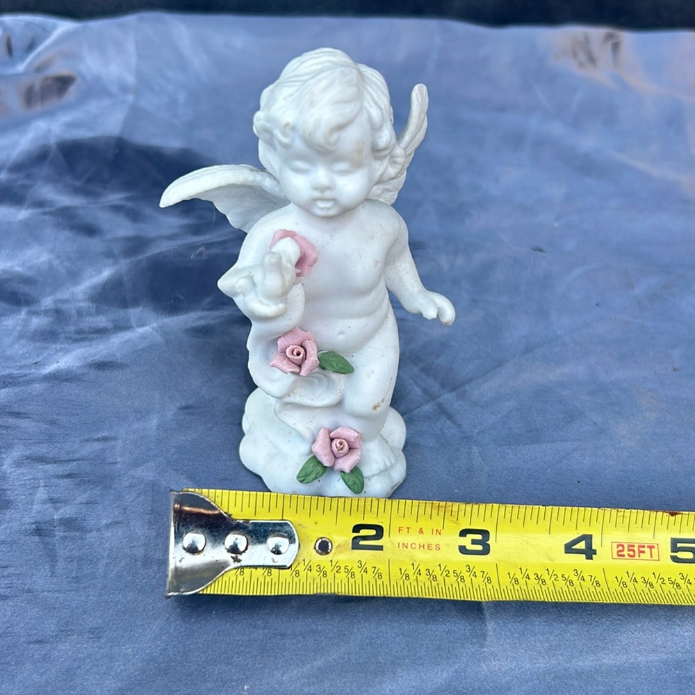 Angel with roses porcelain figurine